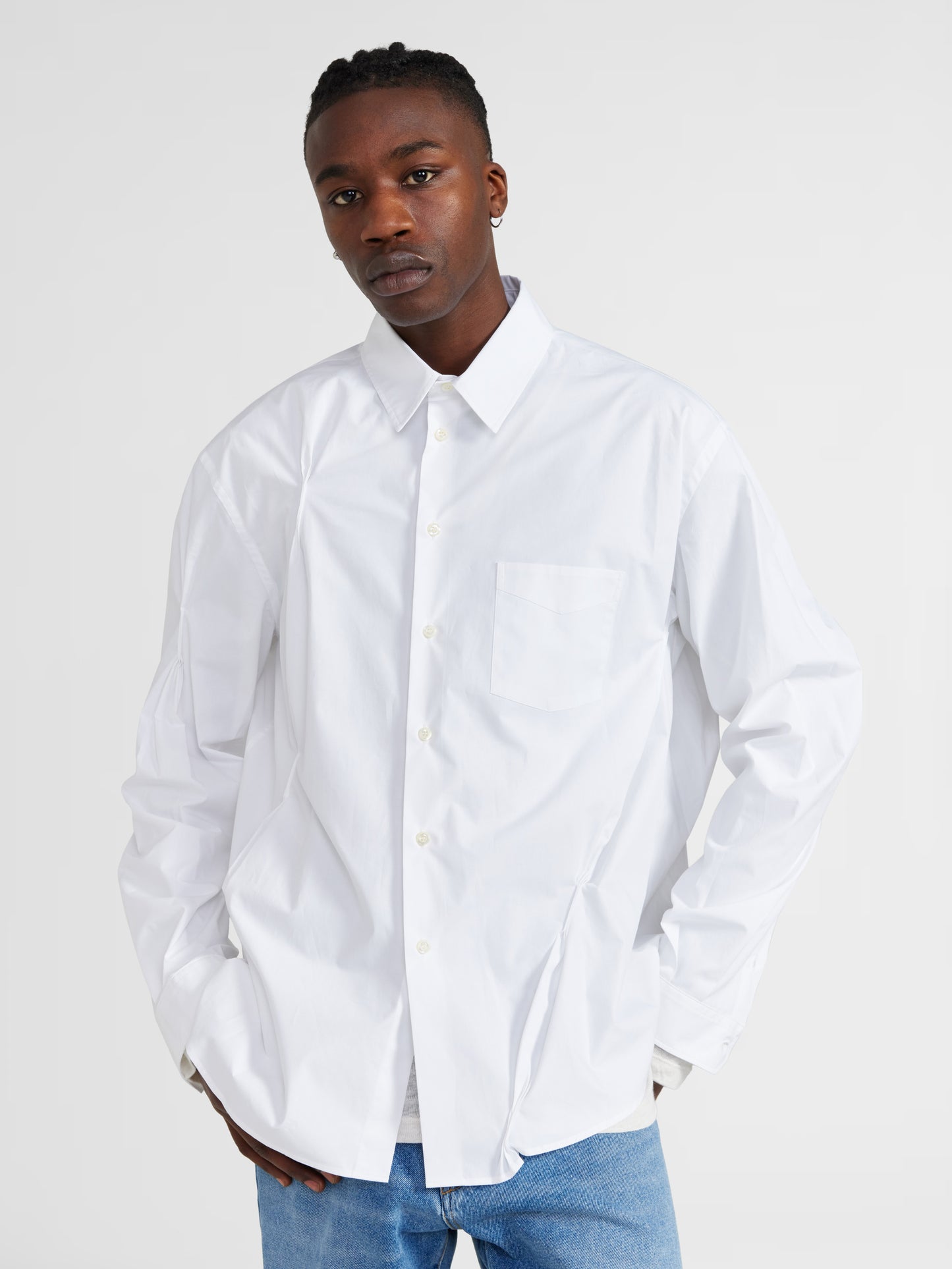 PLEATED WHITE BUTTON UP