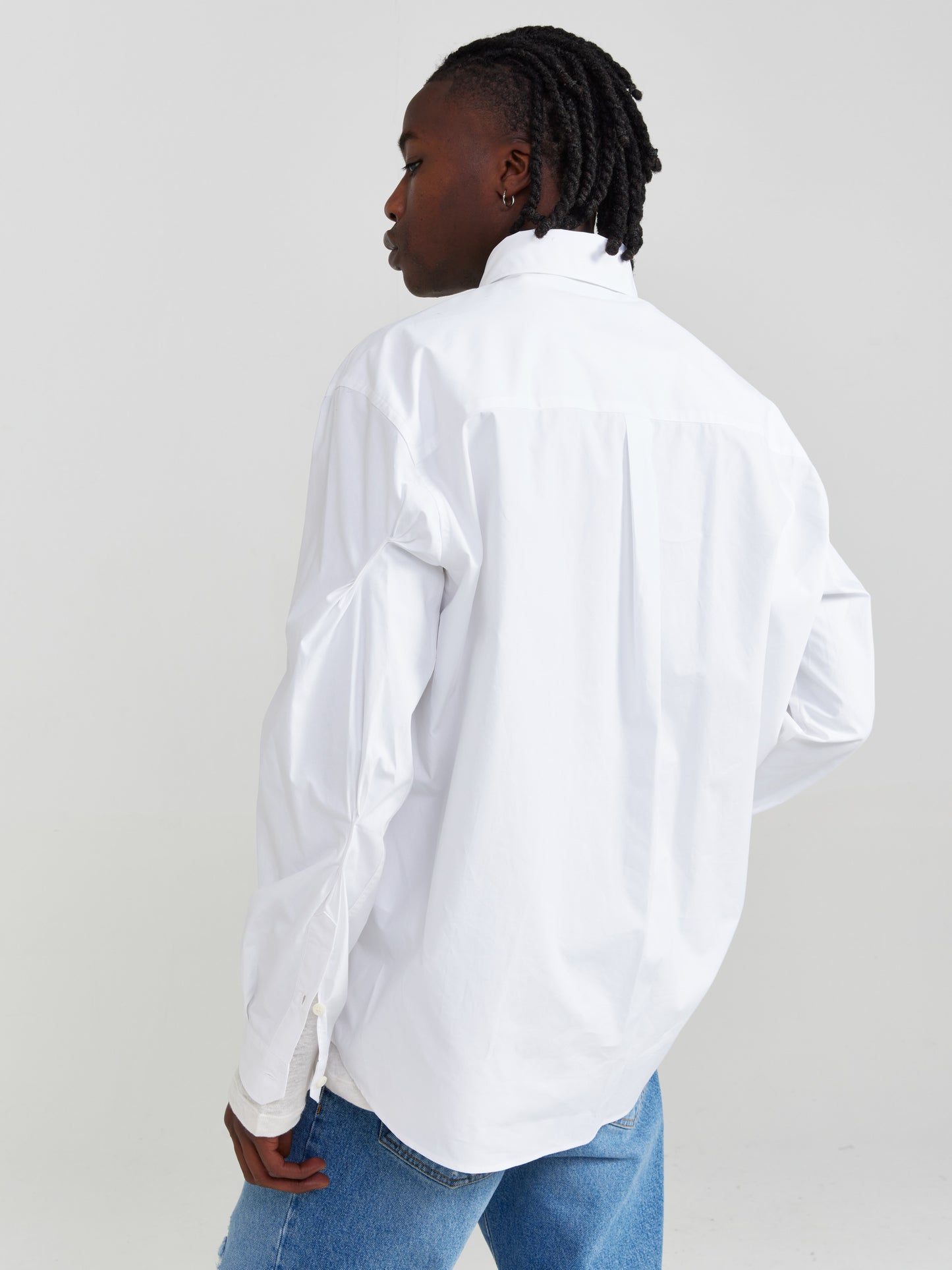 PLEATED WHITE BUTTON UP