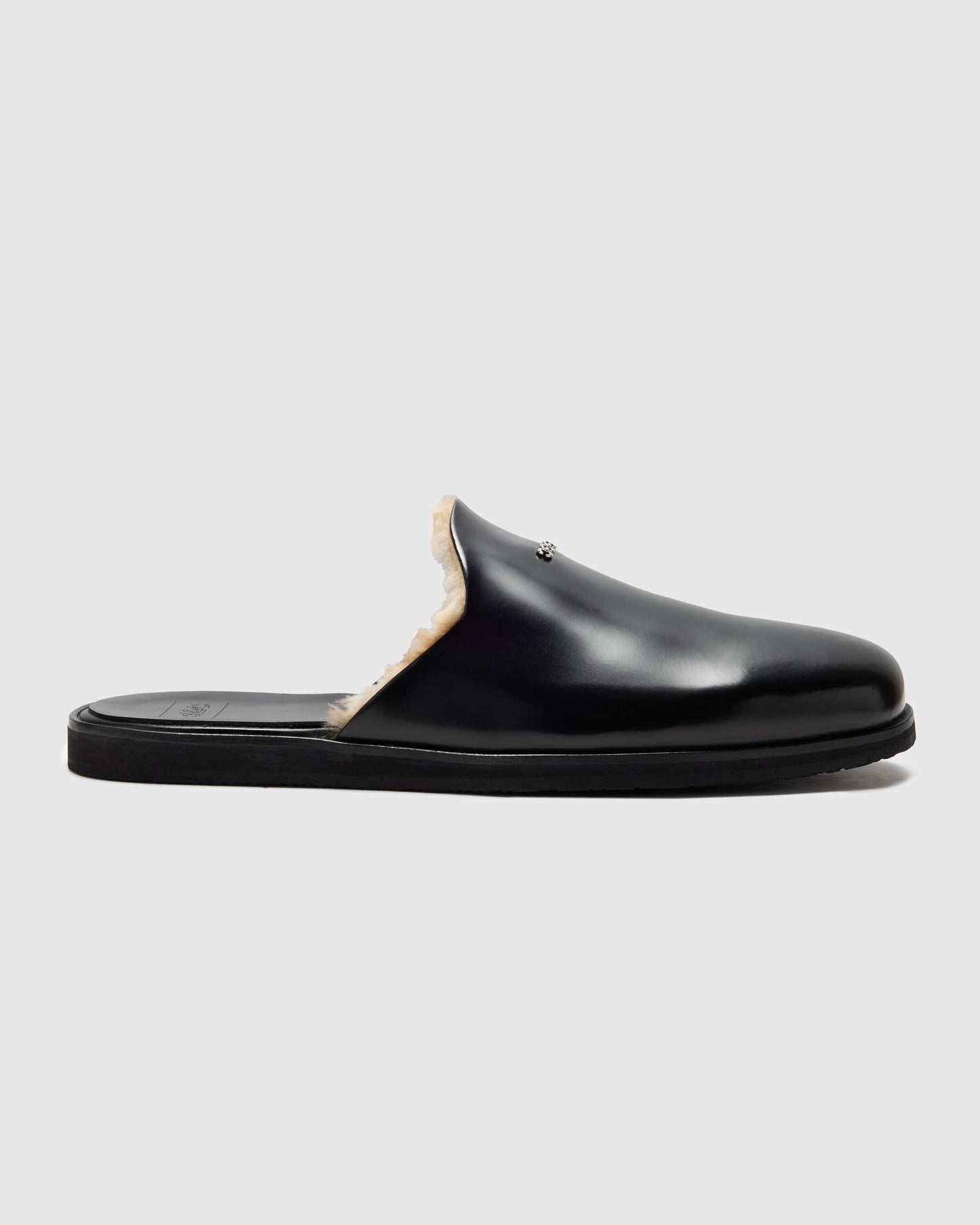LEATHER AND SHEARLING SLIDES IN BLACK