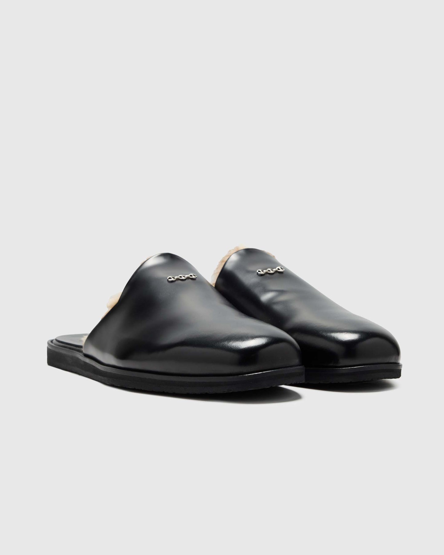 LEATHER AND SHEARLING SLIDES IN BLACK