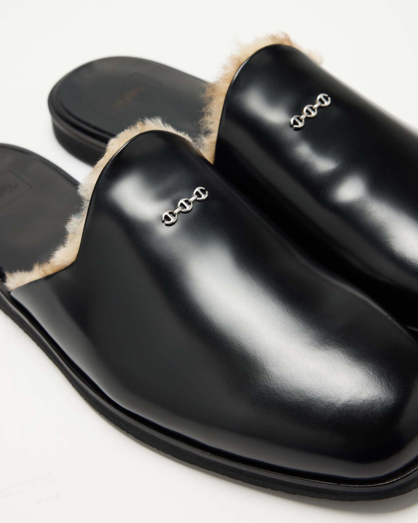 LEATHER AND SHEARLING SLIDES IN BLACK