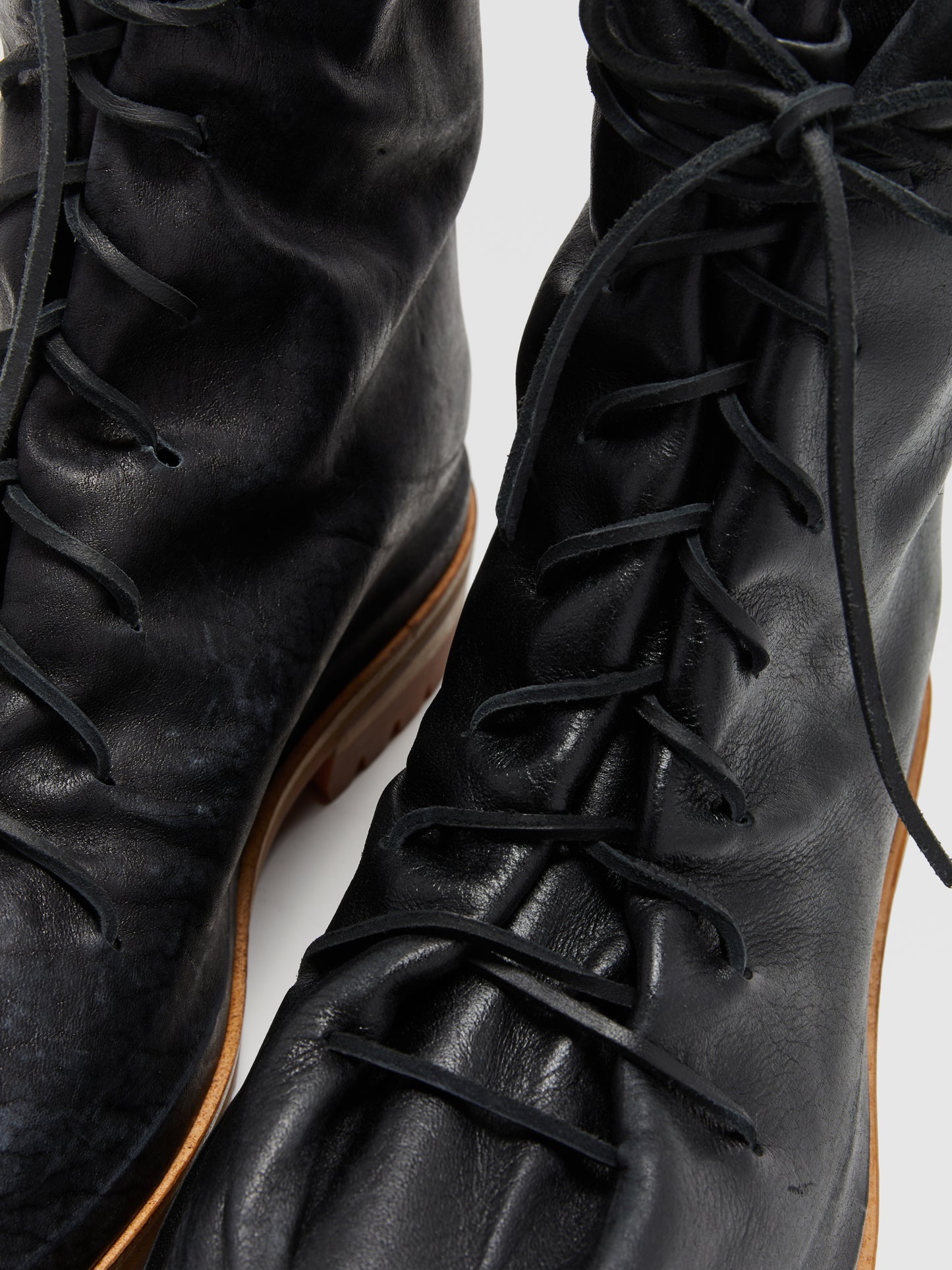 BLACK DISTRESSED LEATHER LACE-UP BOOTS