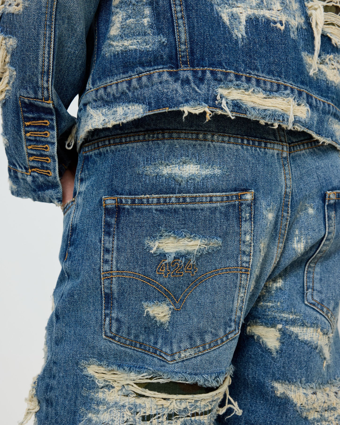 COLLECTION LOOSE DENIM FIVEPOCKET BLUE REPAIRED CAMO PATCHES